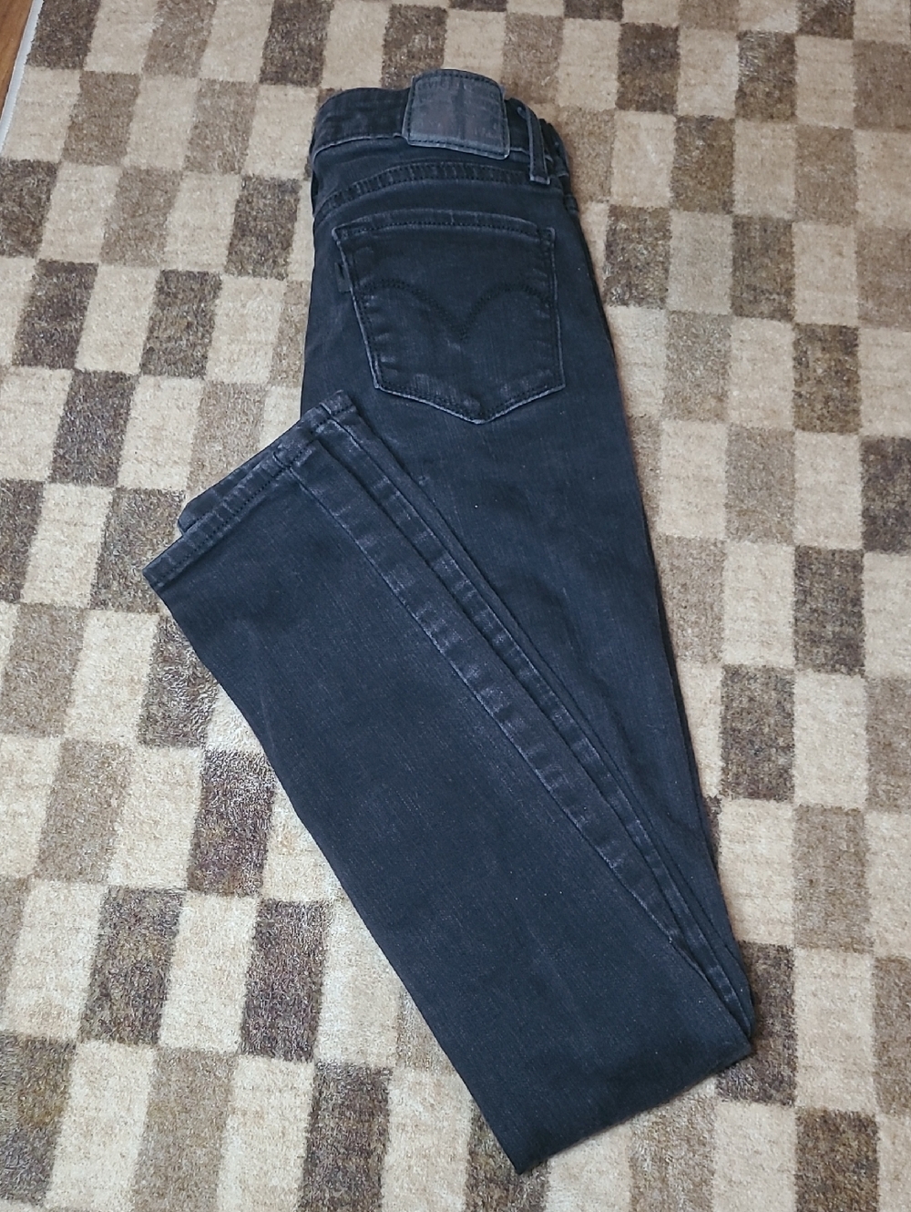 Levis 711 Skinny Ripped Black Jeans
